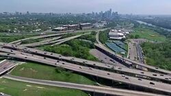 Aerial Austin Texas over Mopac Interchange at Downtown Cesar Chavez and 5th street Moving Away from Skyline Cityscape Stock Footage