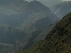 "L-R diagonally upwards pan of hazy dramatic mountains and valley, Amazonas region of Peru [PerÃƒÂº]" Stock Footage