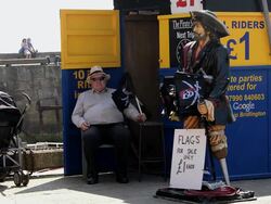 PIRATE SHIP PLEASURE BOAT RIDES AND FLAGS Stock Footage
