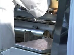 Glass jar with black olive on scale Stock Footage