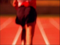 MS out of focus, track athletes running away from camera, Australia Stock Footage