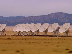 SIDE POV, Car driving through desert, passing Very Large Array, New Mexico, USA Stock Footage