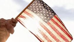 Senior Woman Holding US Flag Stock Footage