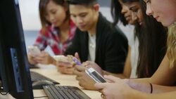 Young adults on their cell phones Stock Footage