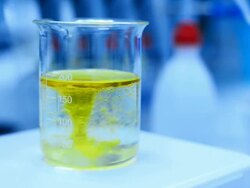 Mixing liquid in beaker Stock Footage