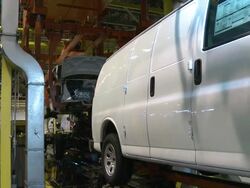 Van bodies are mounted on frame and transmission Stock Footage