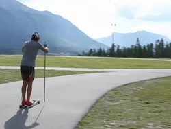 Biathalon racers train at Nordic Center Stock Footage
