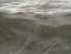 Castaway help message in bottle floating at sea Stock Footage