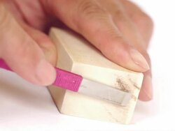 Plane wood with a knife. Stock Footage