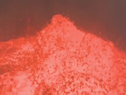 Lava splashes in waves at night in erupting volcano, Marum Volcano, Ambrym Island, Vanuatu Stock Footage