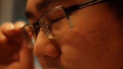 salary man watching screen, reflection in glasses Stock Footage