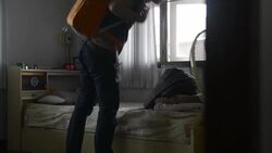 Young man traveler in the hostel Stock Footage