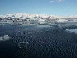 WS T/L Melting glacier floating and moving on jokulsarlon lake / Iceland Stock Footage