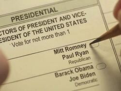 XCU of voter using pencil to mark presidential ballot for Mitt Romney Stock Footage