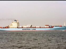 A Navy destroyer has arrived on the scene where pirates are holding the captain of a U.S. Cargo ship hostage off the Somali coast.  The pirates were forced onto a lifeboat but won't release the captain. News Clip