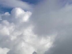 Aerial pan cumulus clouds/ Cork, Ireland Stock Footage
