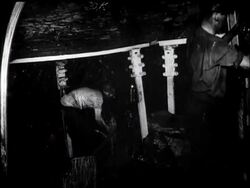 At the Coalface. British Movietone News Descends 700ft. Below Ground. News Clip