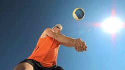 HD Super Slow-Mo: Young Man Playing Beach Volleyball Stock Footage