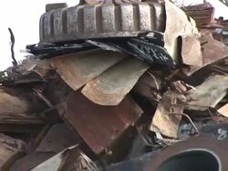 CU POV Magnet lifting steel scrap at scrapyard / Bous, Saarland, Germany Stock Footage