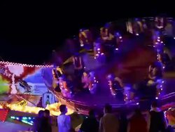 MS PAN Shot of People enjoying amusement ride at funfair / Cologne, Germany Stock Footage