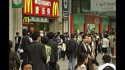 Busy Shopping District & McDonalds in Shanghai News Clip