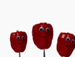 Three Peppers Faces Stock Footage