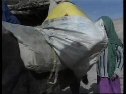 VOICED US troops help dig wells as drought enters fourth year Instructional Video