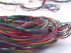Multicolor wire on white background Stock Footage