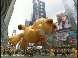 WS PAN Garfield parade balloon on Thanksgiving Day parade, New York City, New York, USA Stock Footage