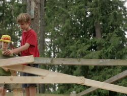 LA Boys hammering post / Vancouver, British Columbia, Canada Stock Footage