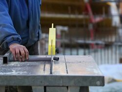 Construction Worker Cutting Plastic Pipe CU Stock Footage