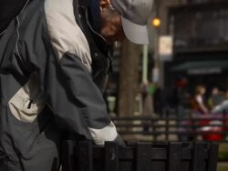 Man Searches in Trash Can - MS Stock Footage