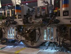 Medium Close Up static - A machine processes paper and comes to a stop /  Wisconsin, United States Stock Footage