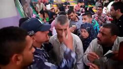 CLEAN : Palestinians wait to cross into Egypt at Gazas Rafah crossing News Clip