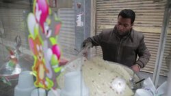 Man making traditional food at a street tent in Cairo Stock Footage
