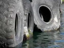 old tires on seaport Stock Footage