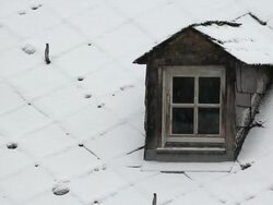 MS View of house window at winter snowfall / Saarburg, Rhineland-Palatinate, Germany Stock Footage
