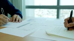 Close-up of a businessman writing a document Stock Footage