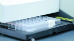 96 well plates on the Plate washer in laboratory Stock Footage