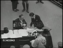 1945: JAPANESE INSTRUMENT OF SURRENDER:  VS Mamoru Shigemitsu sitting at table on USS Missouri, signing Japan Instrument of Surrender, Douglas MacArthur signing, various United States soldiers &amp; officers watching. WWII, Tokyo Bay, September 2nd Instructional Video