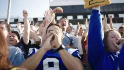 Spectators cheer at a sporting event. Stock Footage