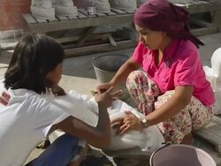 MS Women polish Buddha statue made of marble / Mandalay, Mandalay Division, Myanmar Stock Footage