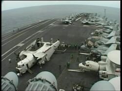 US military conducting tsunami aid opertaions from ship mored off Indonesia News Clip