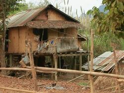 MS Shot of house made by bamboo slats woven /  Vang Vieng, Vientiane, Laos Stock Footage