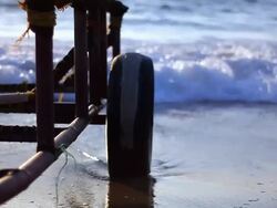Boat trailer close-up, hit by wave slow motion Stock Footage