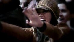 Excited fans scream and reach out for celebrities walking red carpet at awards show Stock Footage