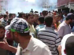 Egyptian Military Shoots Tear Gas Into Crowd Stock Footage