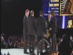 Keith Urban (receiving award) at the 59th Annual BMI Country Awards at Nashville TN.  Stock Footage