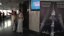 Figure skating champion carries flame atop the 337 Ostankino TV tower Instructional Video