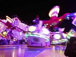 MS Shot of People enjoying amusement ride at funfair, flying bobs / Cologne, Germany Stock Footage